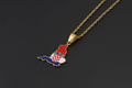 Croatia-shaped pendant with flag colors on a gold chain