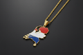 Netherlands-shaped pendant with flag colors on a gold chain